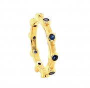 14k gold sea grass eternity band with sapphires
