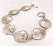Ss and 14k gold clamshell and starfish bracelet